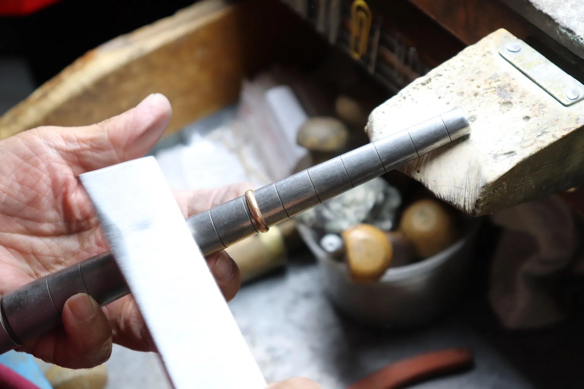 Jeweler resizing a ring